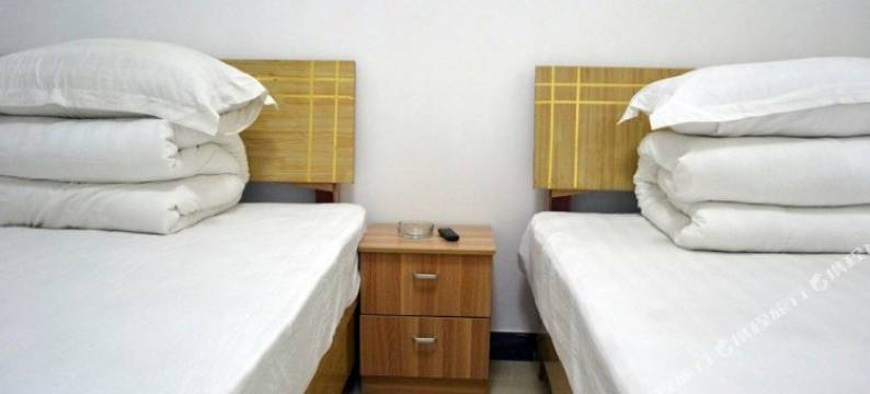 新郑靠谱宾馆(宝相寺步行街店)图片